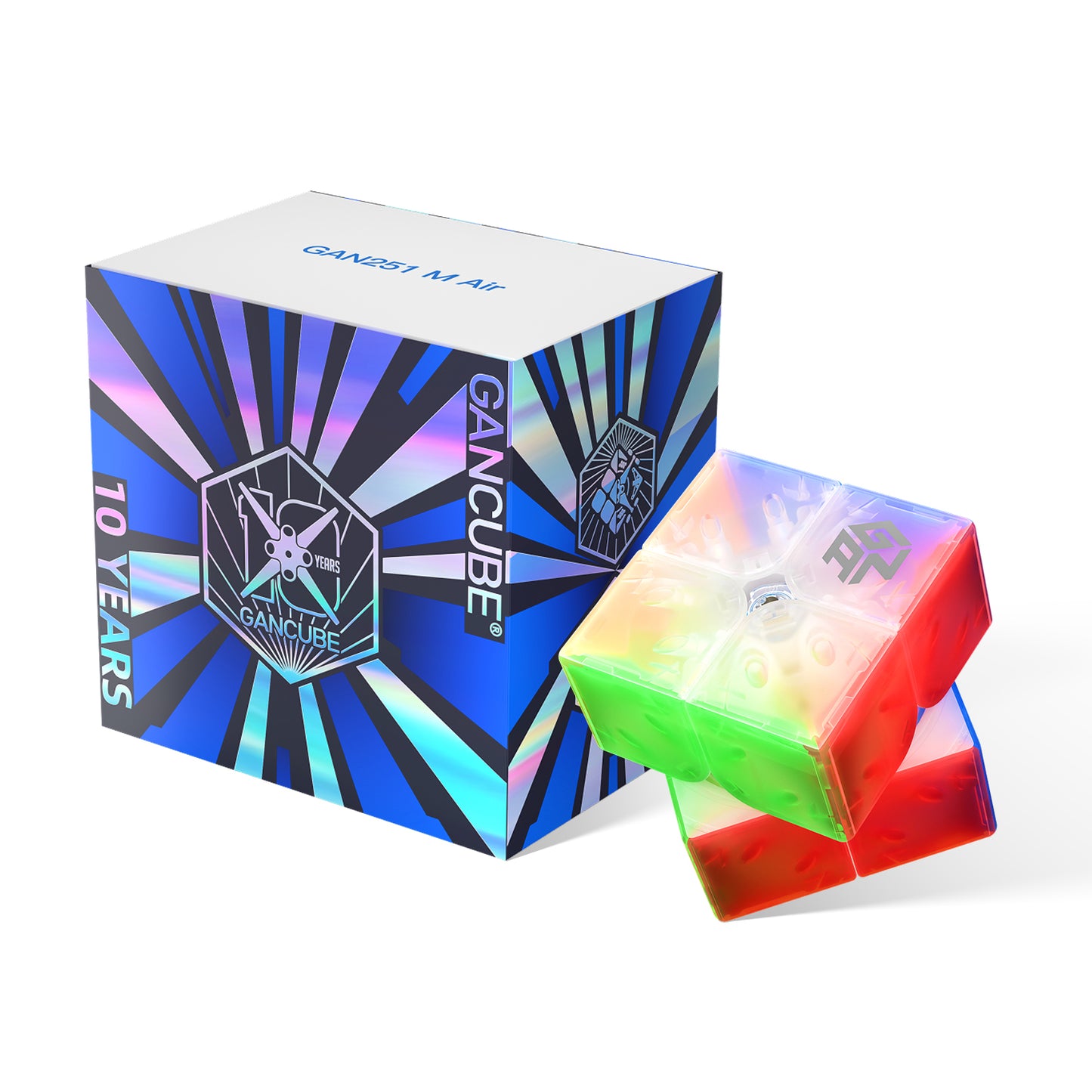 Colorful transparent GAN251 M Air speed cube next to holographic 10 years GANCube anniversary packaging