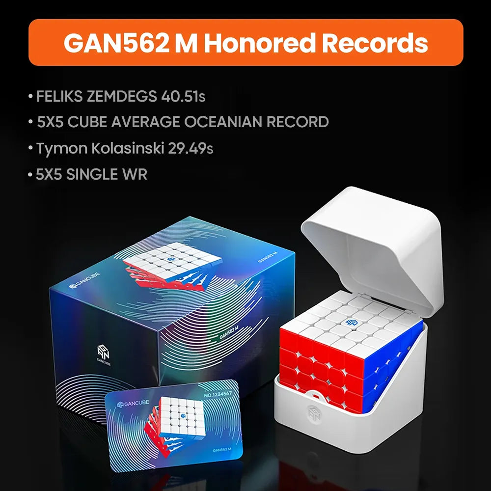A white cube puzzle box with an open lid holding a partially solved red, white, and blue cube, shown beside its blue retail box and a small blue card on a black background. Orange text at the top reads 'GAN562 M Honored Records' with performance stats listed on the left.