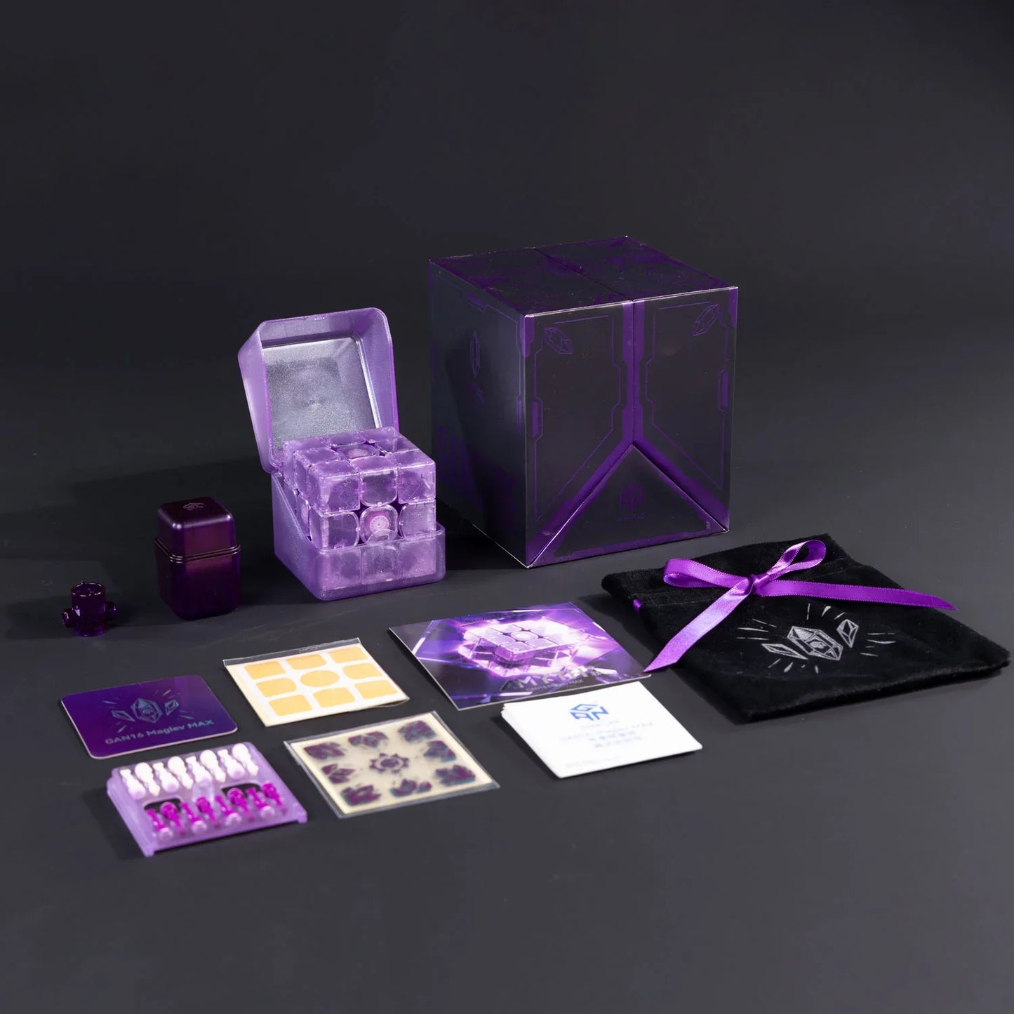 Purple GAN 16 Maglev Max speed cube with accessories and black pouch on gray background
