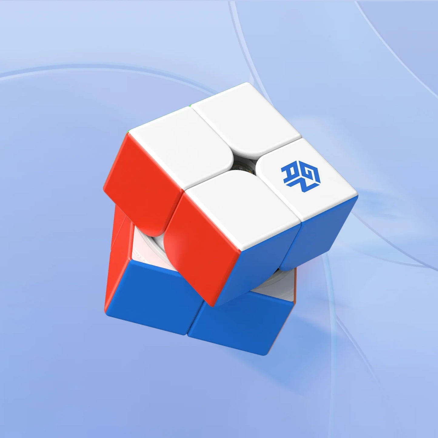 GanCube 2x2 speed cube with white, red, and blue tiles on light blue background