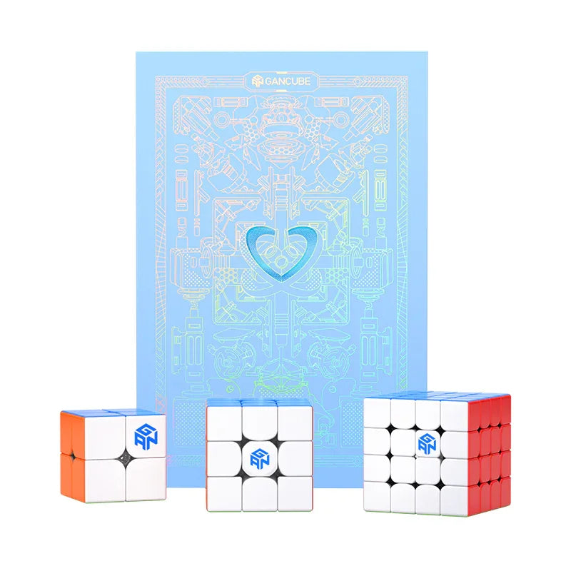 Three GAN Cube speed cubes of different sizes displayed in front of a blue GAN Cube gift box with intricate line art design