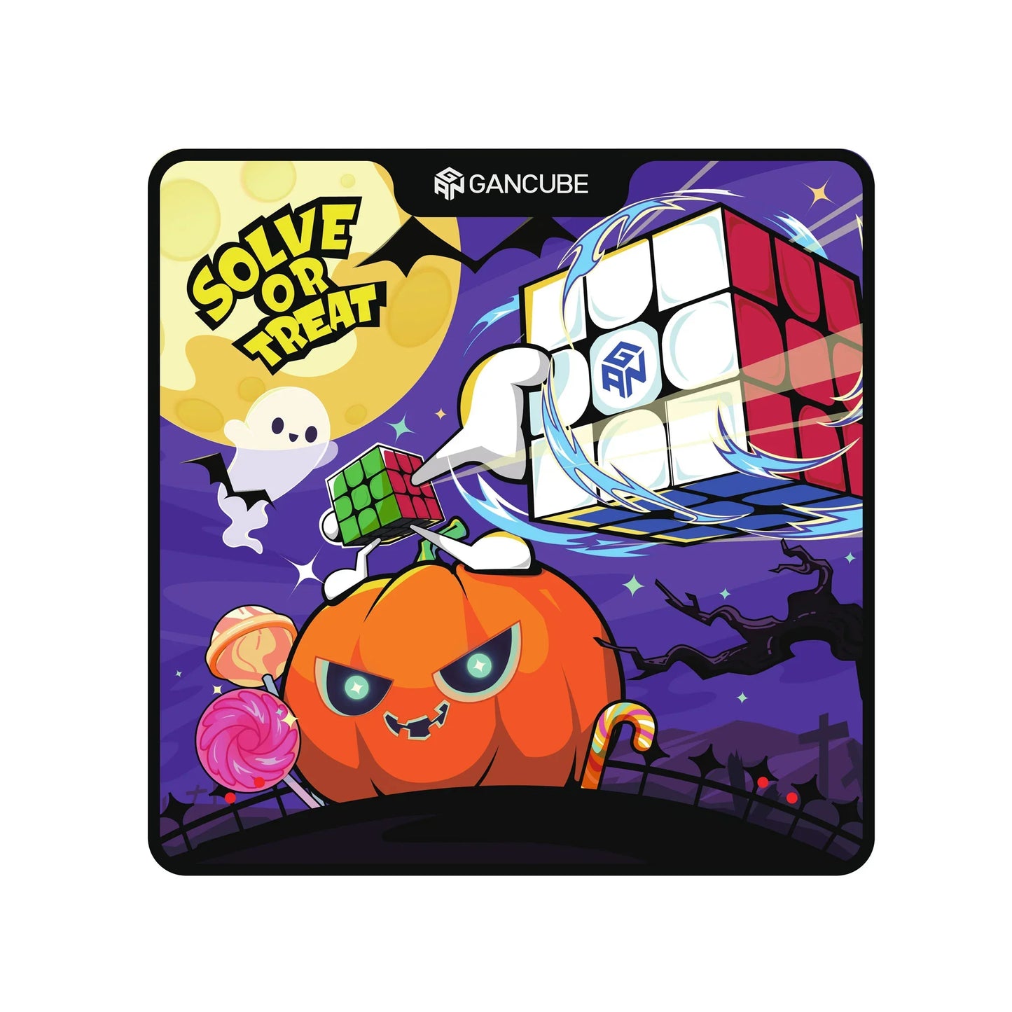 GanCube Halloween mat featuring a glowing pumpkin, ghost, bats, Rubik’s cubes, and candy under a full moon