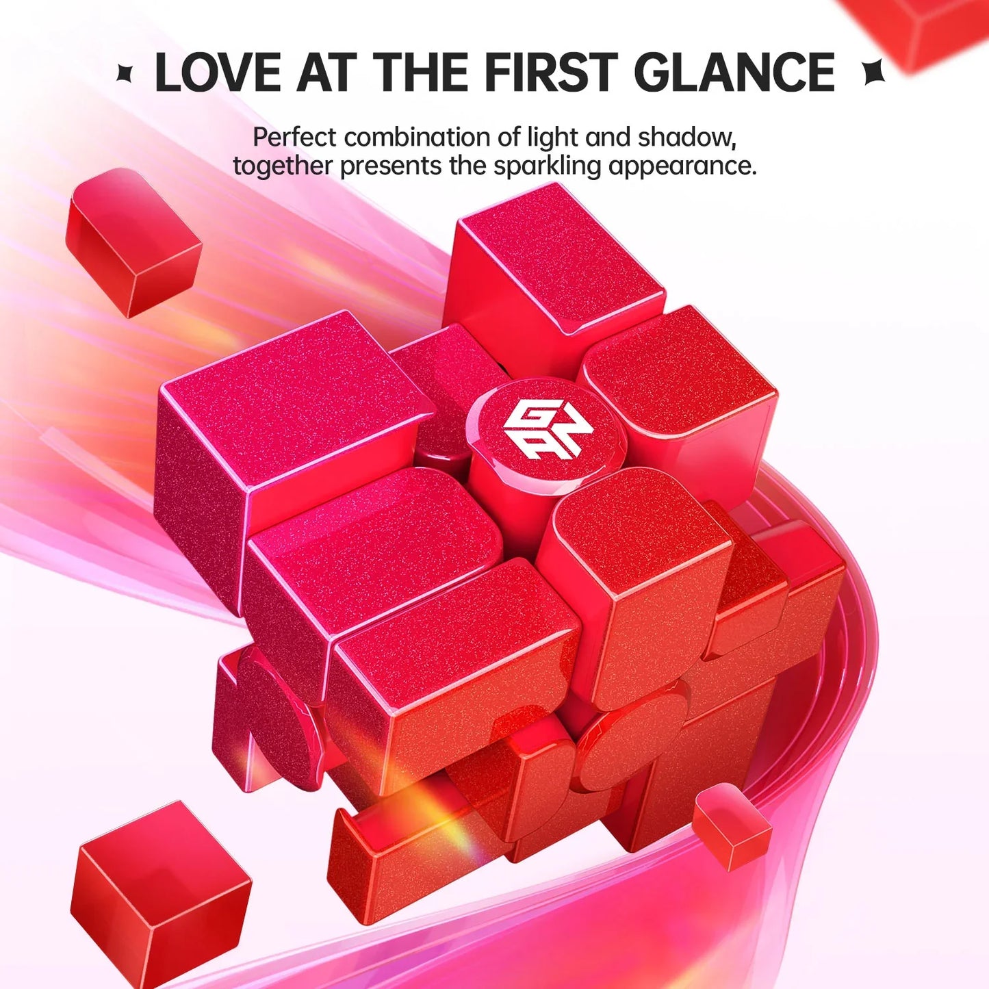 Red GAN Cube Mirror M with sparkling finish and dynamic light streaks on white background