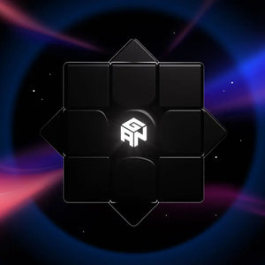 Black GAN flagship 3x3 speed cube with illuminated logo against a cosmic background