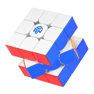Partially solved GANCUBE 3x3 speed cube showing red, blue, and white sides with textured pieces