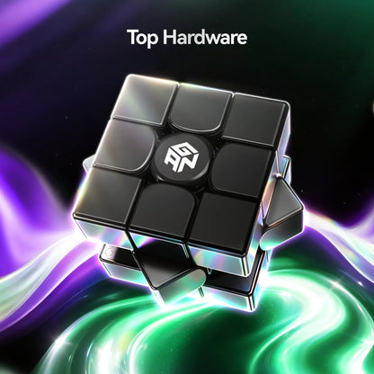 A black 3x3 puzzle cube with a white logo on the center piece, floating above a glowing green and purple abstract background. The text 'Top Hardware' is visible at the top.