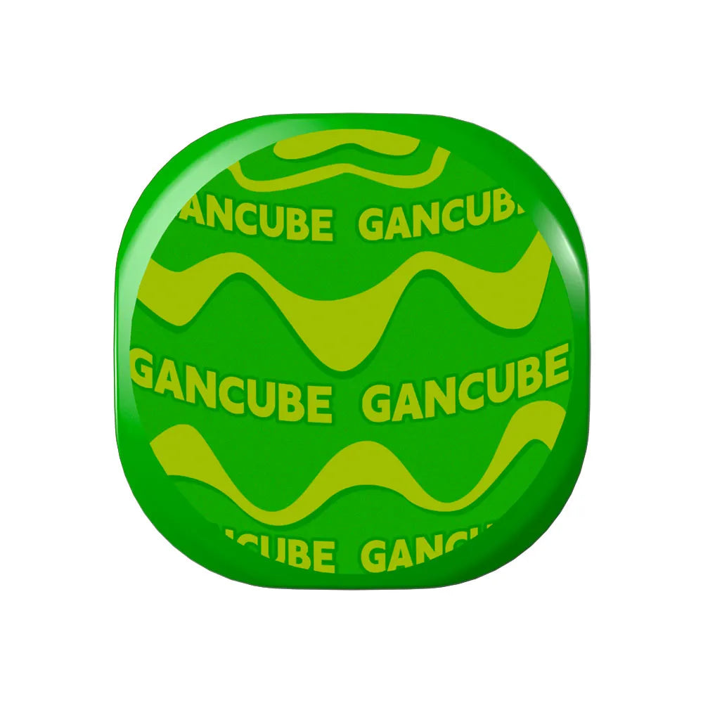 Green button with 'GANCUBE' text and wavy design on a white background