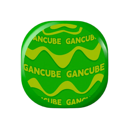 Green button with 'GANCUBE' text and wavy design on a white background