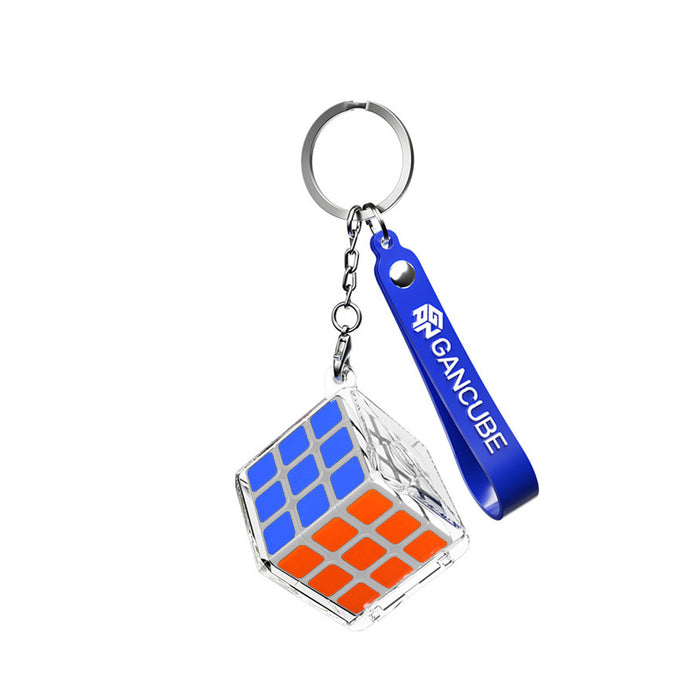 GANCUBE 3x3 mini transparent puzzle cube keychain with blue and orange tiles and blue branded strap