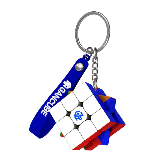 GAN Cube 3x3 speed cube keychain with blue strap on white background