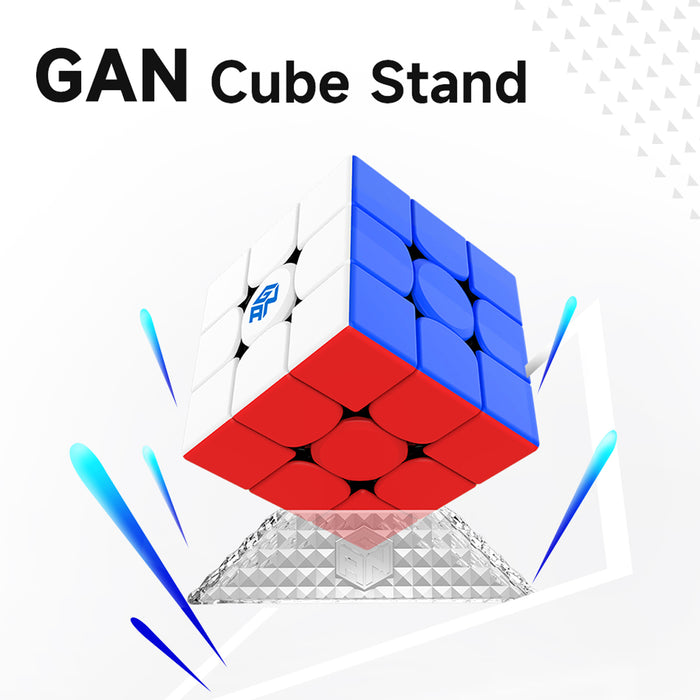 Gan Cube displayed on a transparent triangular stand with white, blue, and red faces