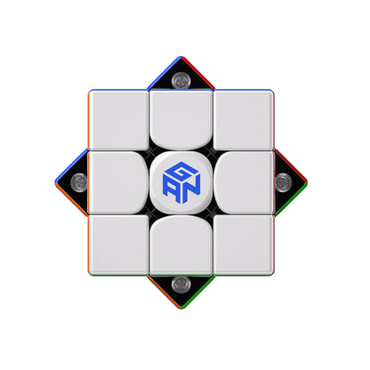 Top view of a GAN Maglev 3x3 speed cube with white face and colored edges on white background